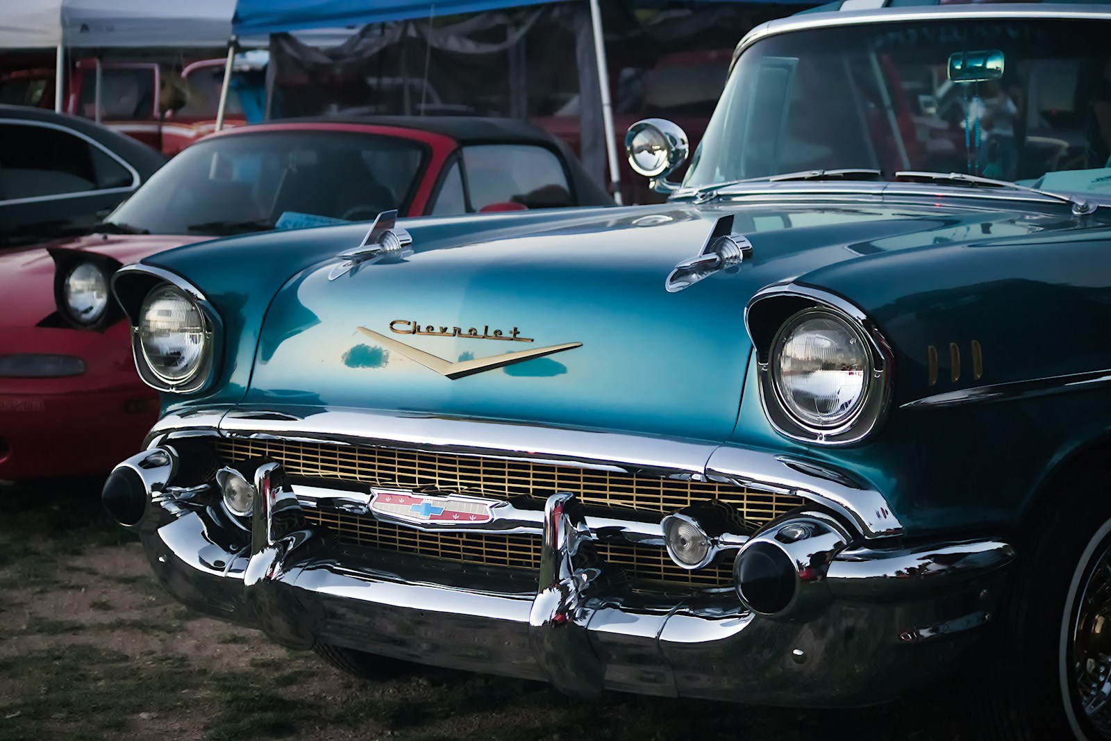 Affordable classic car parked outside a garage